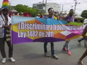 Día del trabajo, foto #3: ¡Discriminar a la población LGBT es un delito! Ley 1482 de 2011.