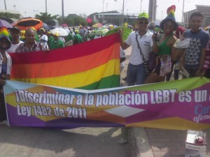 Día del trabajo, foto #4: ¡Discriminar a la población LGBT es un delito! Ley 1482 de 2011.